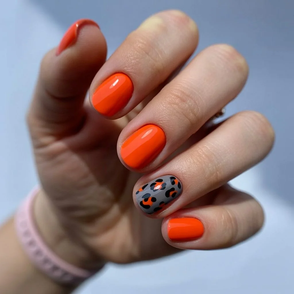 neon summer nails 2026 Neon Orange Leopard With A Cool Twist