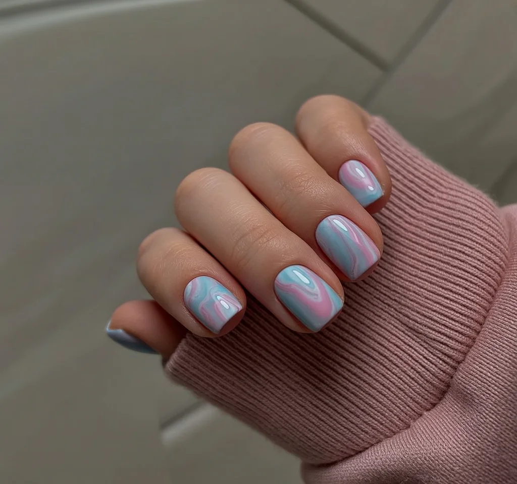 summer acrylic nails 2026 Pastel Swirl Nails With A Soft Candy Effect