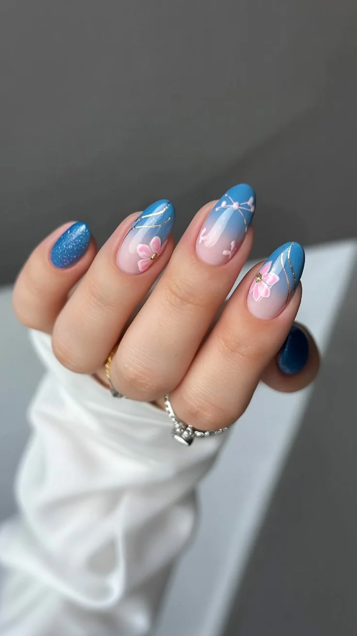 summer beach nails 2026 Blue Floral Sunset Nails with Soft Coastal Romance