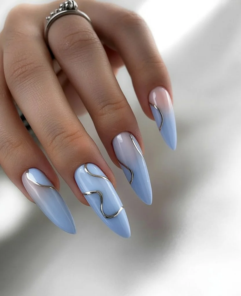 summer dip nails 2026 Sky Blue Sculpted Nails With Modern Chrome Details