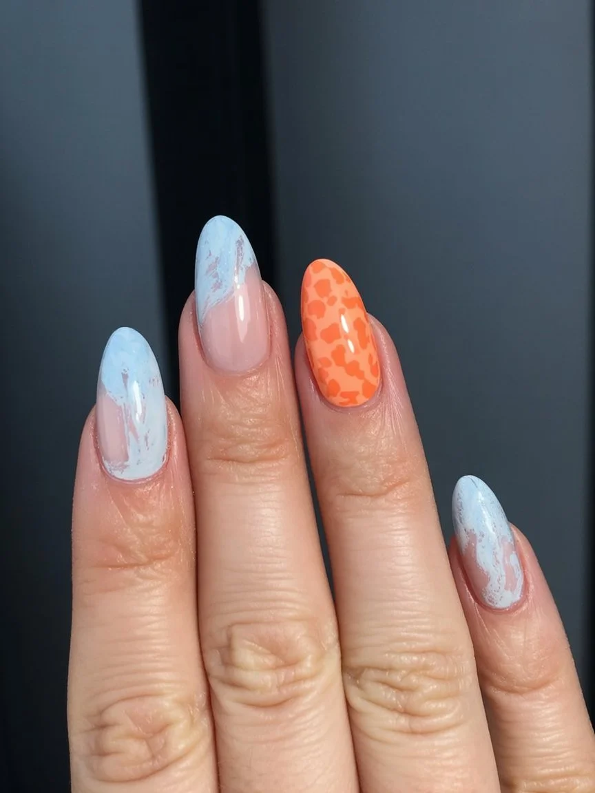 summer nail art 2026 Soft Marble and Peach Pop Nails with Modern Art Vibes