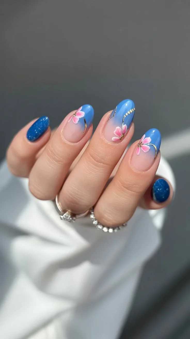 Summer nail art ideas 2026 Blue Blossom Nails With Soft Romantic Energy