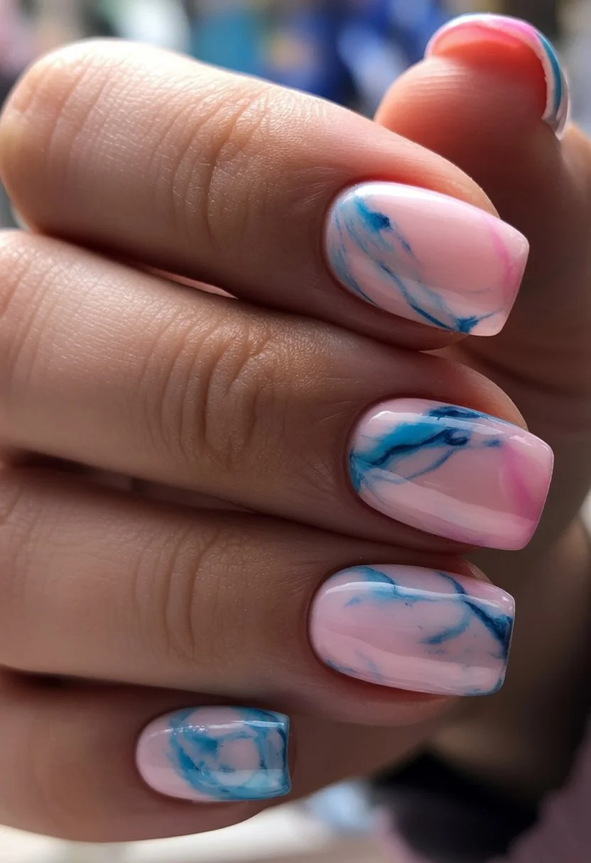 Summer nail art ideas 2026 Soft Marble Clouds In Pink And Blue