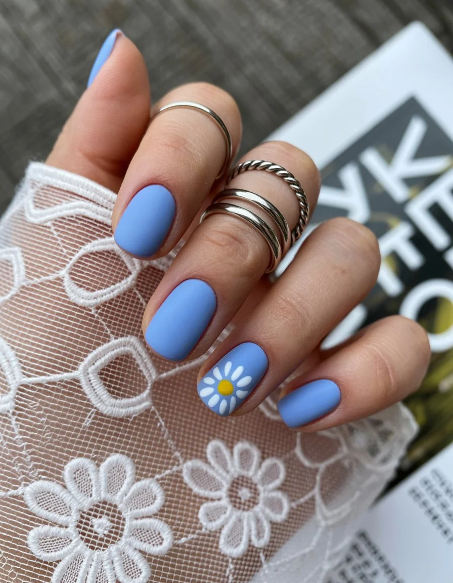 summer short nails ideas 2026 Sky Blue Daisy Nails With Retro Summer Charm
