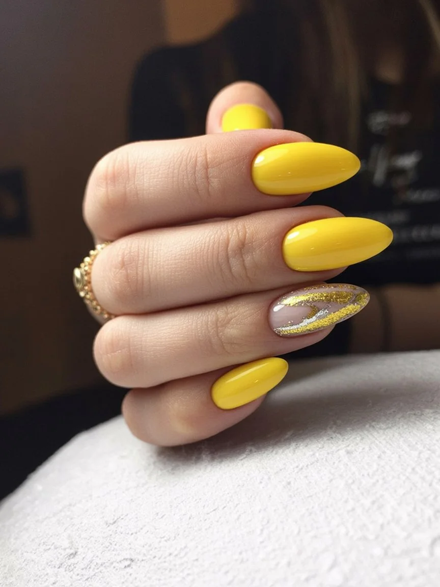 Summer yellow nails 2026 Golden Almond Nails With Glitter Wave Accents