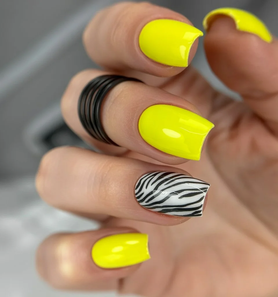 Summer yellow nails 2026 Neon Zebra Nails With Bold Summer Attitude