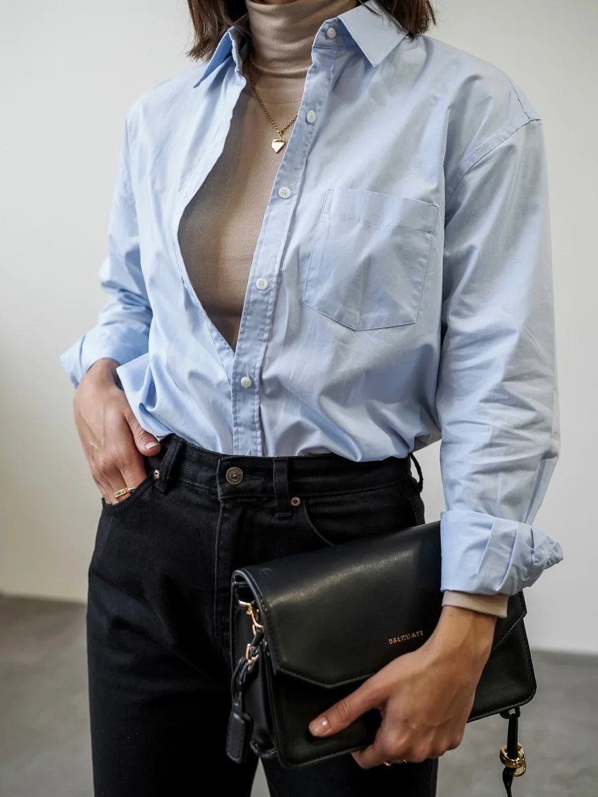 Fall outfits with pants 2026 Light Blue Shirt and Black Denim for a Sharp Everyday Uniform