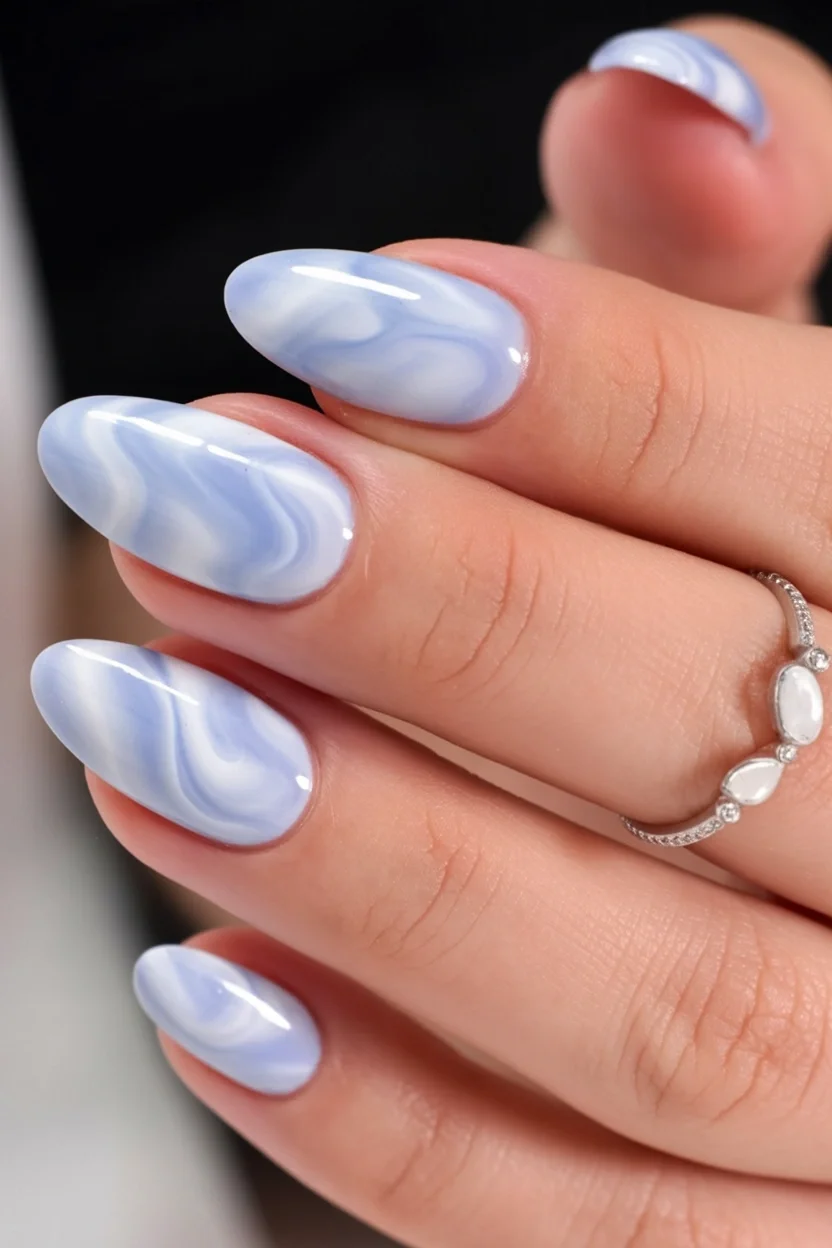 summer oval nails 2026 Cloudy Blue Marble Nails Inspired By Coastal Mornings