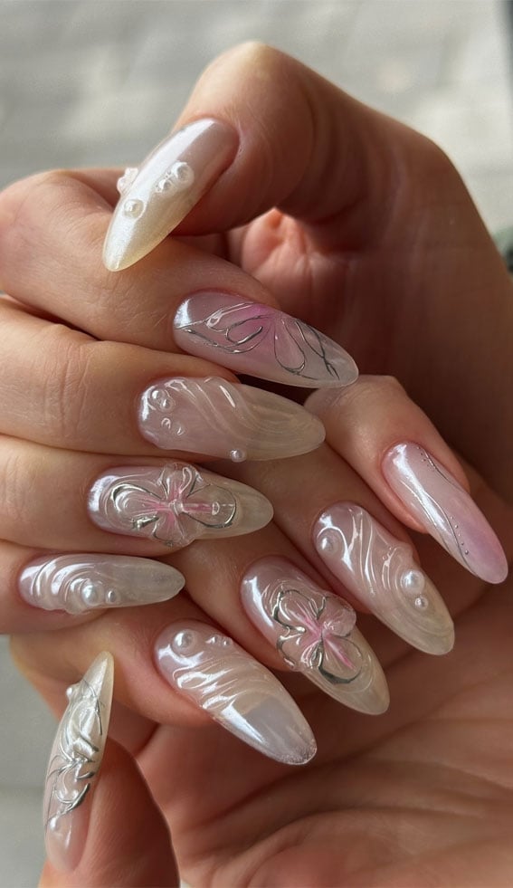 Medium Almond With 3D Charms And Flowers Medium Almond With 3D Charms And Flowers — 3D Nails Art Ideas
