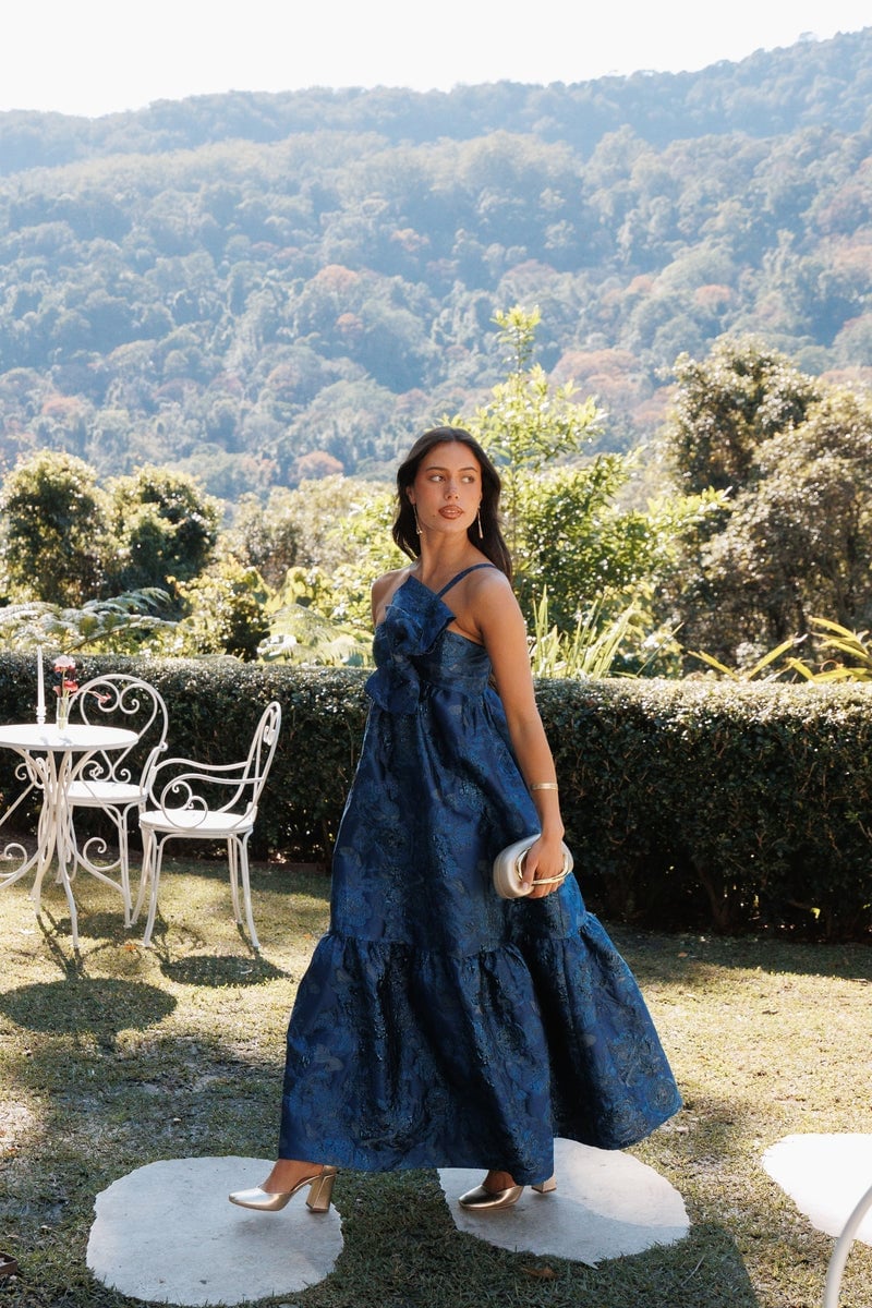 Deep Blue Brocade Maxi Dress with Tiered Skirt and Metallic Gold Heels — Aesthetic Blue Dress Outfit