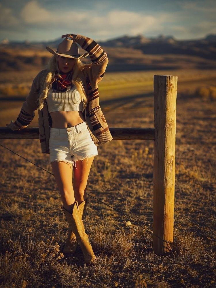 Tan Leather Cowboy Boots With Knit Cardigan and Denim Shorts — Aesthetic Cowgirl Boots Outfit