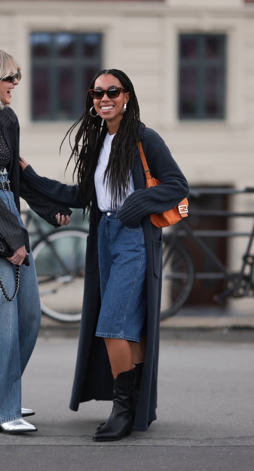 Black Pointed-Toe Cowboy Boots With Bermuda Shorts and Cardigan — Aesthetic Cowgirl Boots Outfit