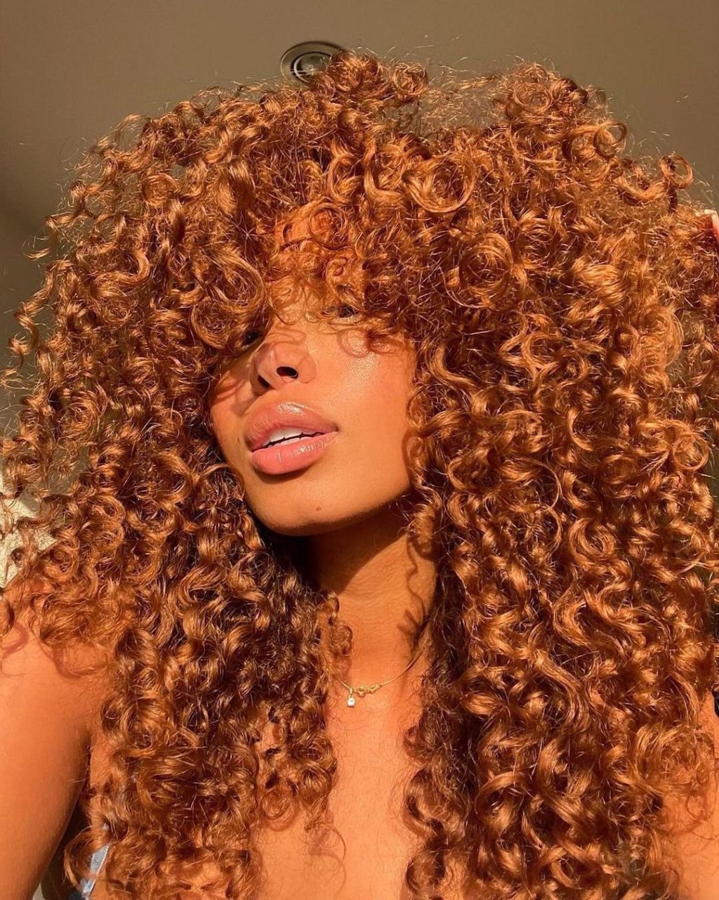 Vibrant Ginger Copper Curls With Curtain Bangs Vibrant Ginger Copper Curls With Curtain Bangs — Aesthetic Ginger Hair