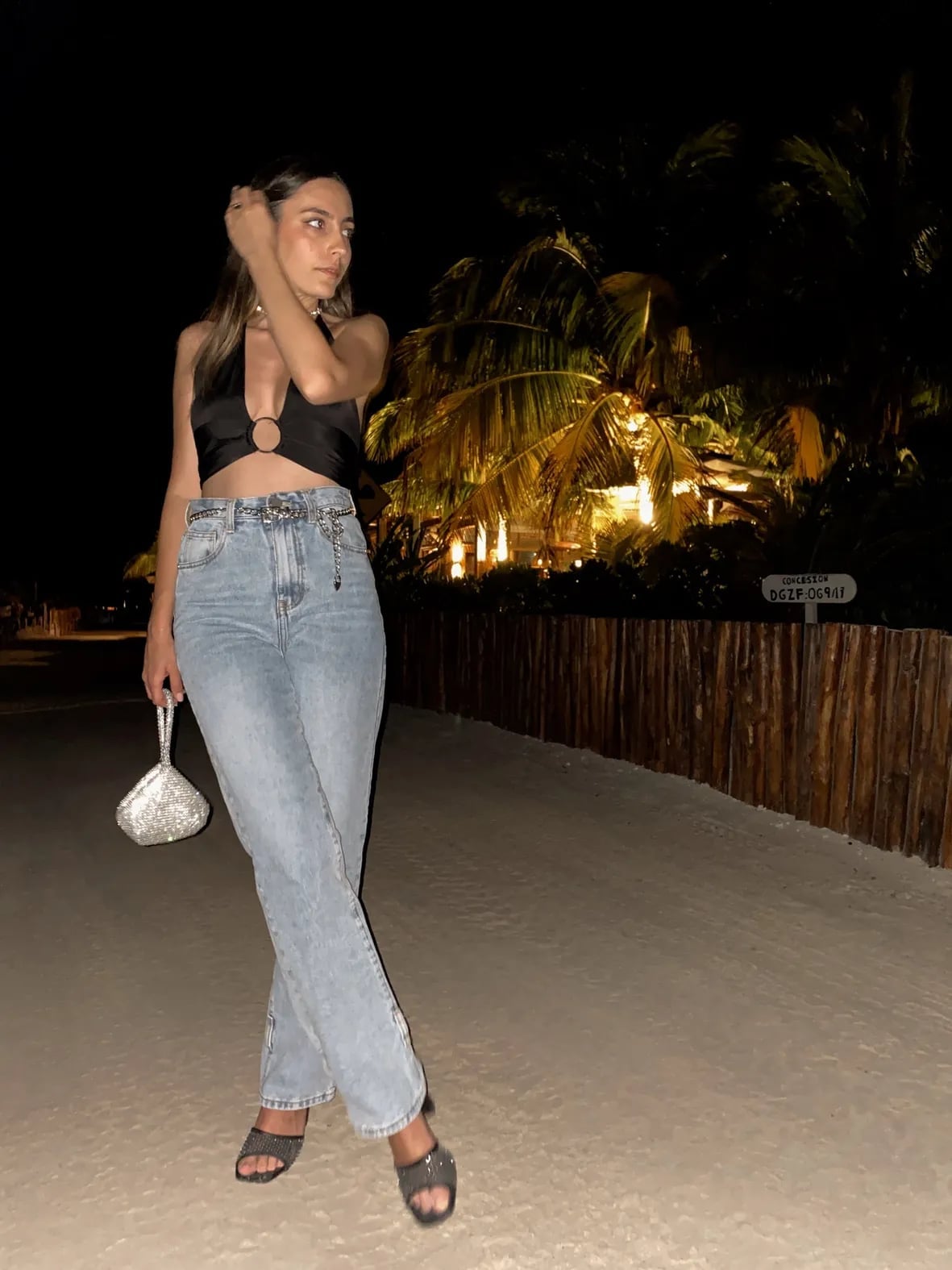 Black Satin Halter Top With Low-Rise Jeans — Aesthetic Going Out Outfits Night