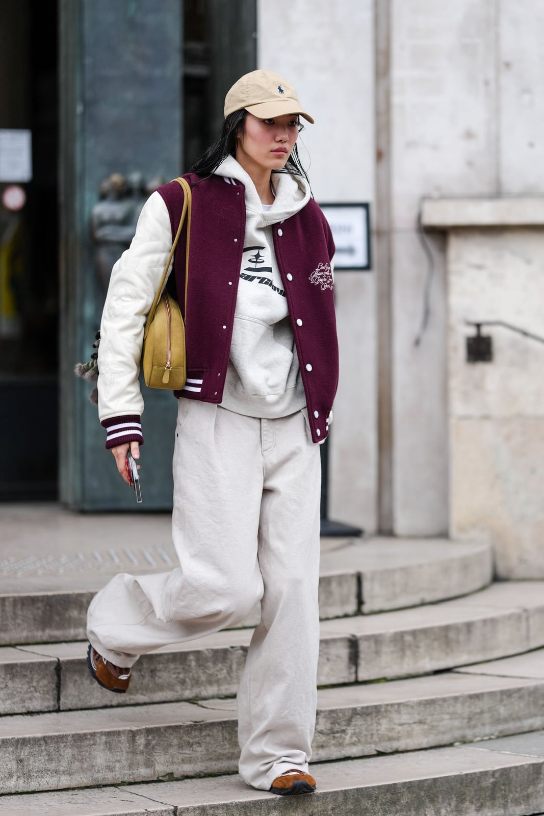 Varsity Jacket Layered Over a Gray Hoodie with Beige Linen Pants Varsity Jacket Layered Over a Gray Hoodie with Beige Linen Pants — Aesthetic Hoodie Outfits Women
