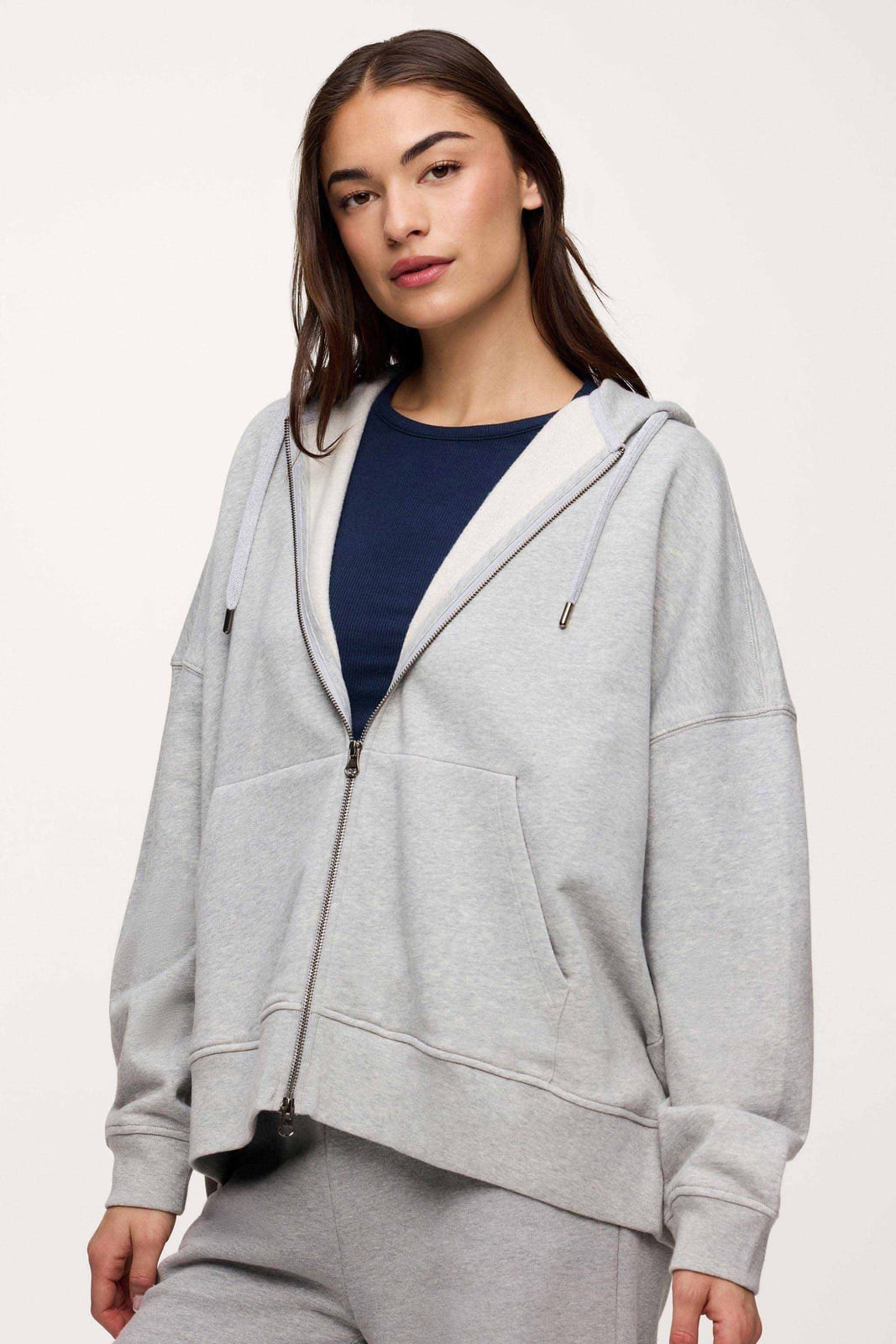 Light Gray Zip-Up Hoodie Over Navy Ribbed Top Light Gray Zip-Up Hoodie Over Navy Ribbed Top — Aesthetic Hoodie Outfits Women