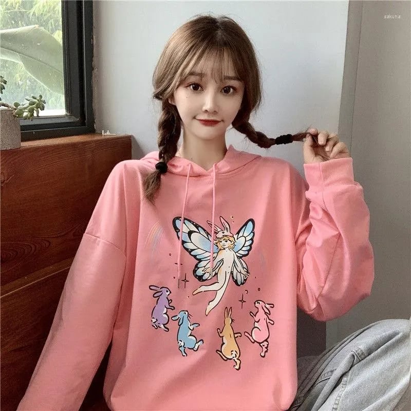 Pink Fairy Graphic Hoodie with Playful Aesthetic Pink Fairy Graphic Hoodie with Playful Aesthetic — Aesthetic Hoodie Outfits Women