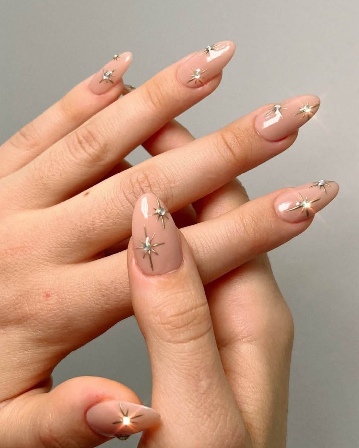 Short Almond Nude with Star Charms — Aesthetic Korean Nail Art