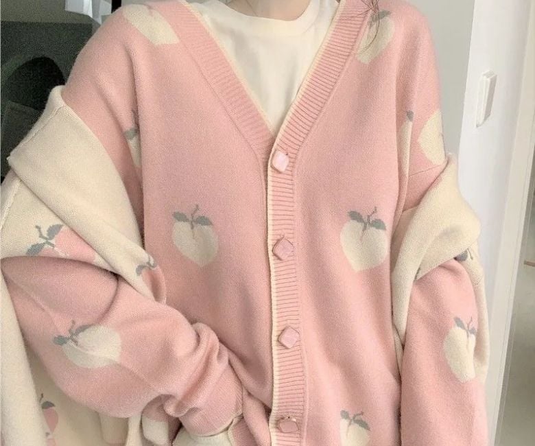 Oversized Pink Cardigan with Cream Trim and Peach Print Oversized Pink Cardigan with Cream Trim and Peach Print — Aesthetic Pink Cardigan Outfit