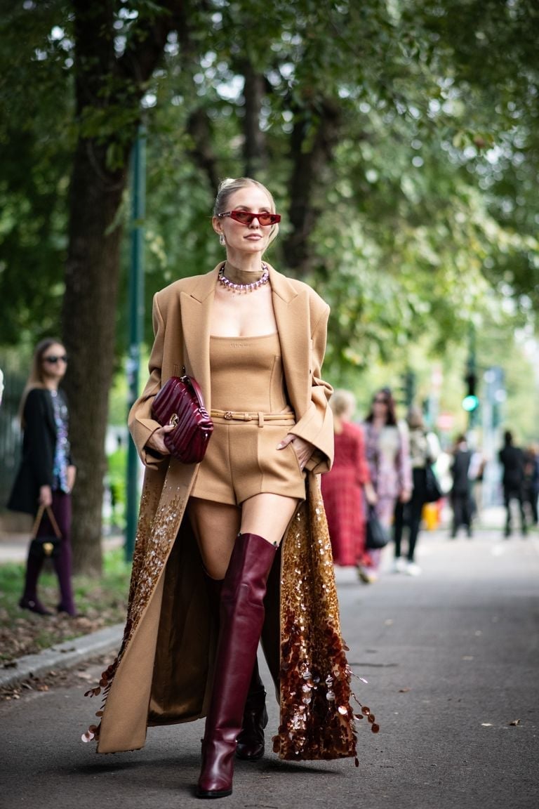 Burgundy Knee High Boots With Camel Coat And Beige Bodysuit Burgundy Knee High Boots With Camel Coat And Beige Bodysuit — Aesthetic Red Boots Outfit