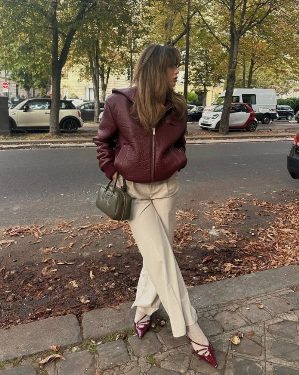 Oversized Burgundy Leather Jacket with Beige Trousers Oversized Burgundy Leather Jacket with Beige Trousers — Aesthetic Red Leather Jacket Outfit