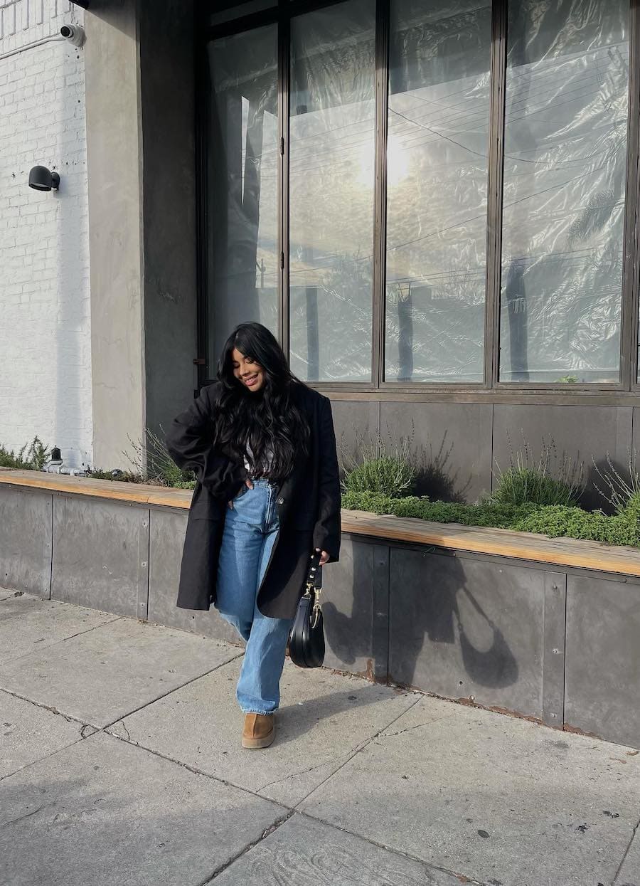 Tan Ugg Tasman Slippers with Wide-Leg Jeans and an Oversized Black Tan Ugg Tasman Slippers with Wide-Leg Jeans and an Oversized Black — Aesthetic Ugg Tasman Outfit