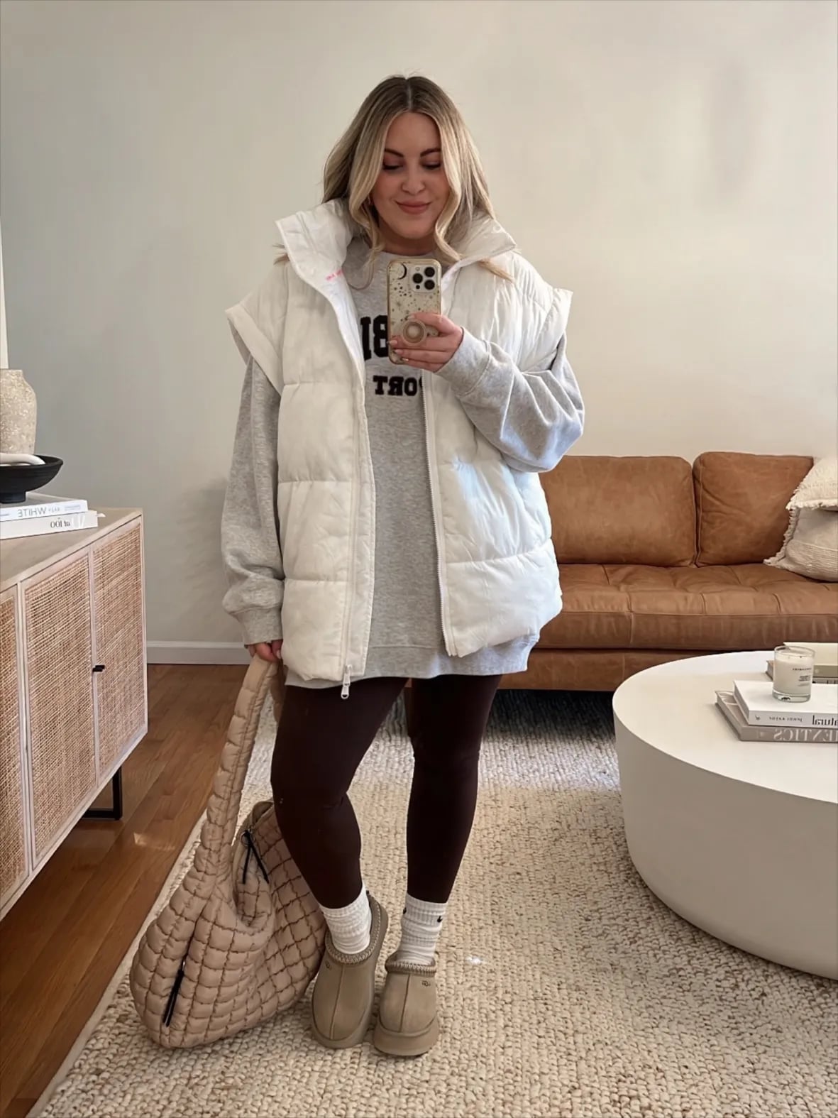 Brown Clogs with Shearling Trim Paired with a White Quilted Vest Brown Clogs with Shearling Trim Paired with a White Quilted Vest — Aesthetic Ugg Tasman Outfit