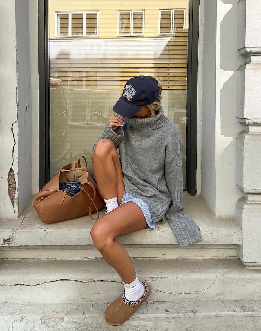 Tan Ugg Clogs with a Gray Turtleneck and Light Blue Shorts Tan Ugg Clogs with a Gray Turtleneck and Light Blue Shorts — Aesthetic Ugg Tasman Outfit