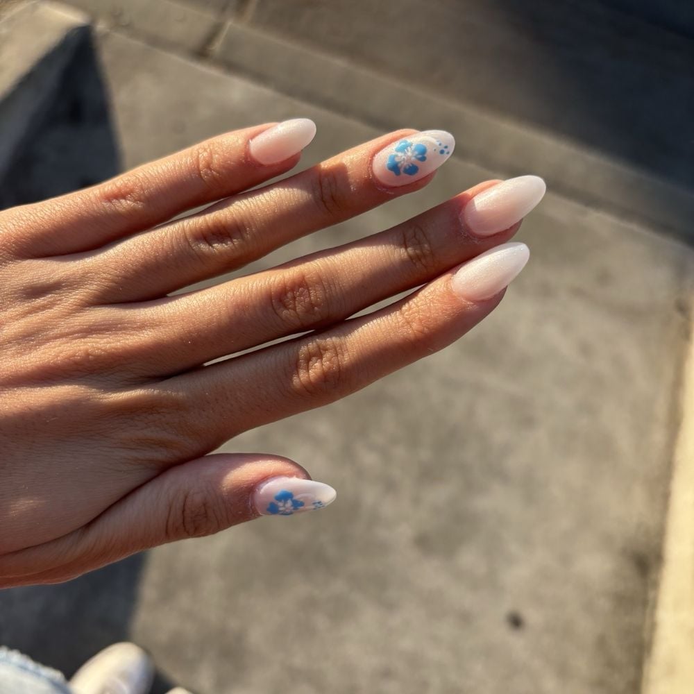 Blue Floral Satin Finish Oval Nails Blue Floral Satin Finish Oval Nails — Aesthetic University Nails