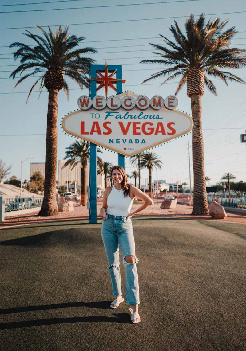 Ripped Light-Wash Jeans with White Tank Top Ripped Light-Wash Jeans with White Tank Top — Aesthetic Vegas Outfits