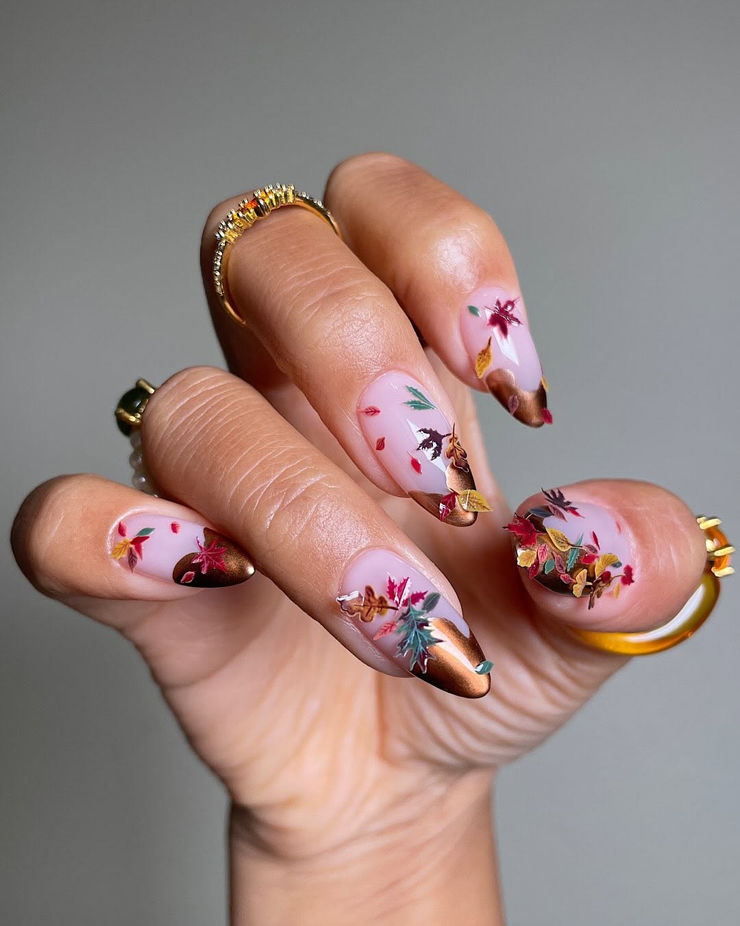Long Almond Nails with Metallic Bronze Tips and Fall Leaves Long Almond Nails with Metallic Bronze Tips and Fall Leaves — Best Cute Almond Nails
