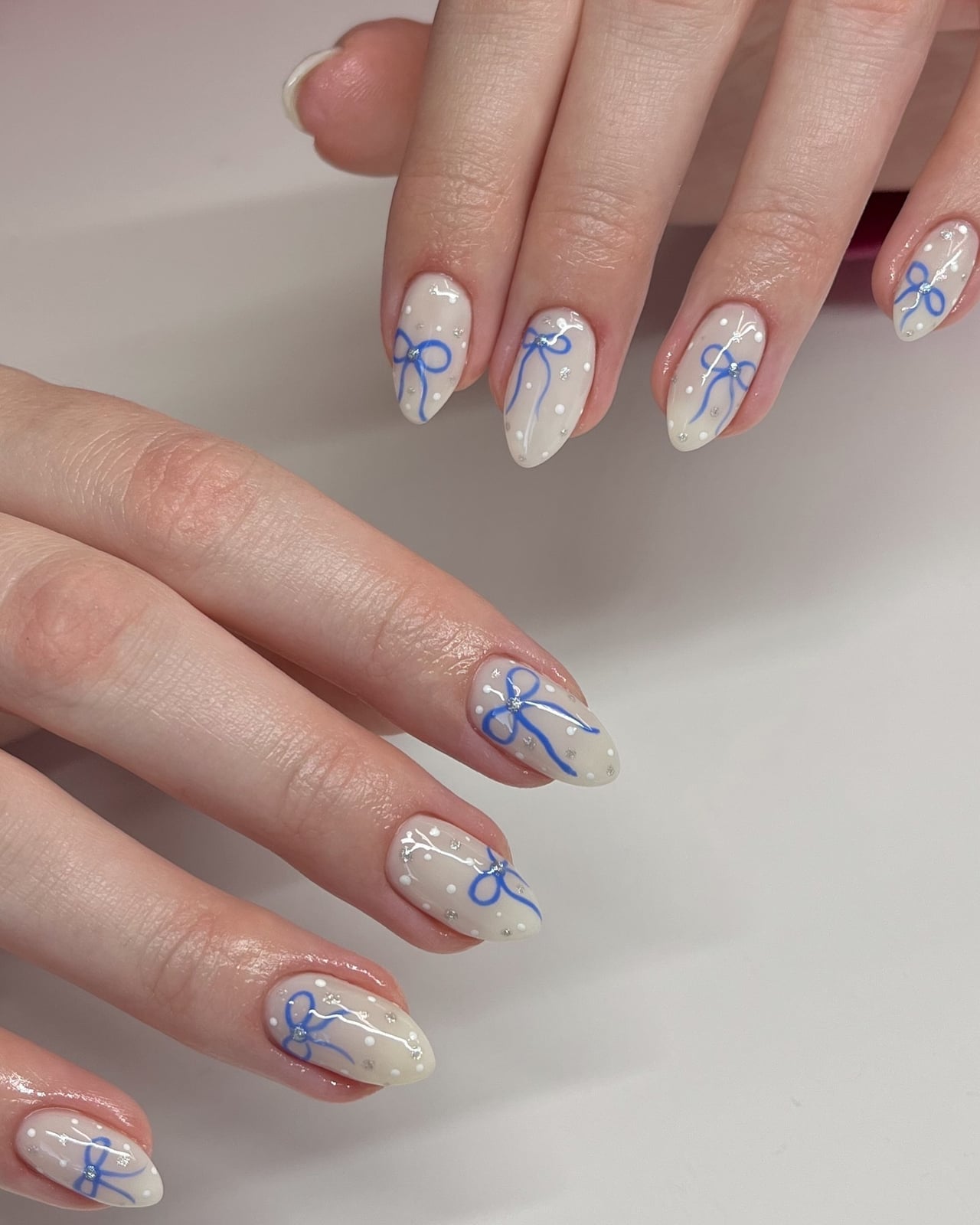Off-White Bows and Glitter Medium Almond Nails Off-White Bows and Glitter Medium Almond Nails — Best Unique Nails