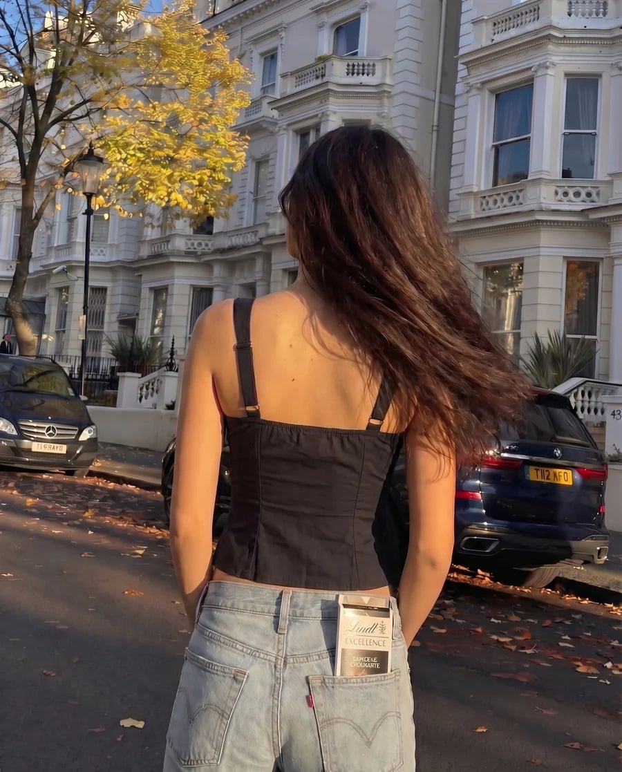 Corset Top with White Trim and Bow with Denim Jeans — Chic Black Corset Outfit