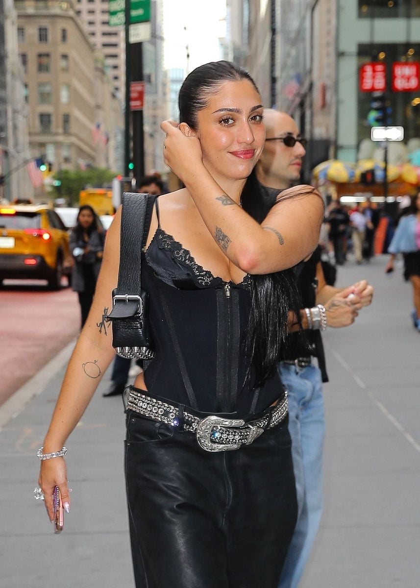 Lace-trimmed Corset with Leather Pants and Statement Belt — Chic Black Corset Outfit