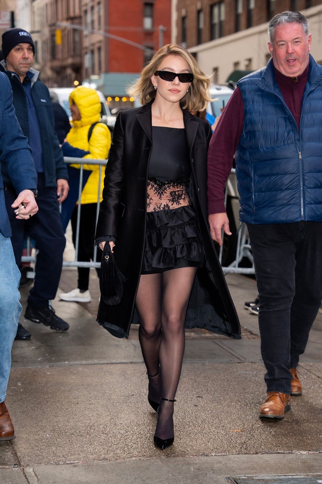 Lace Corset Mini Dress Under Oversized Coat — Chic Black Corset Outfit