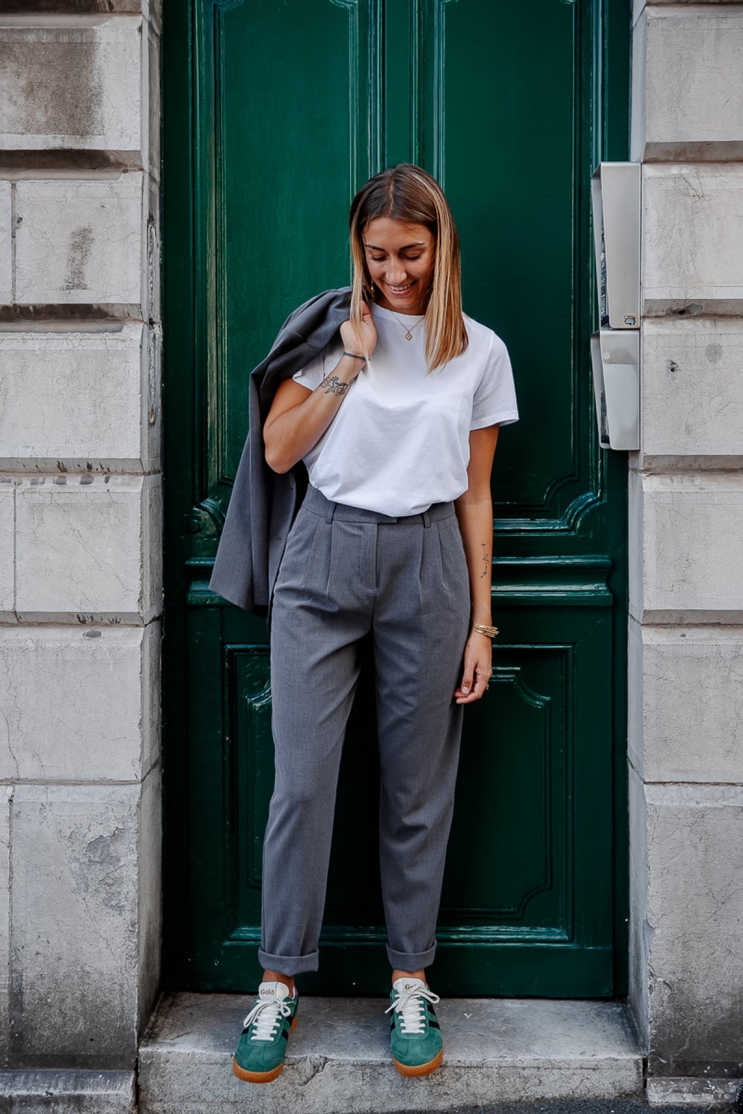 Gray Tailored Trousers with White T-Shirt and Green Sneakers Gray Tailored Trousers with White T-Shirt and Green Sneakers — Chic Femme Outfit