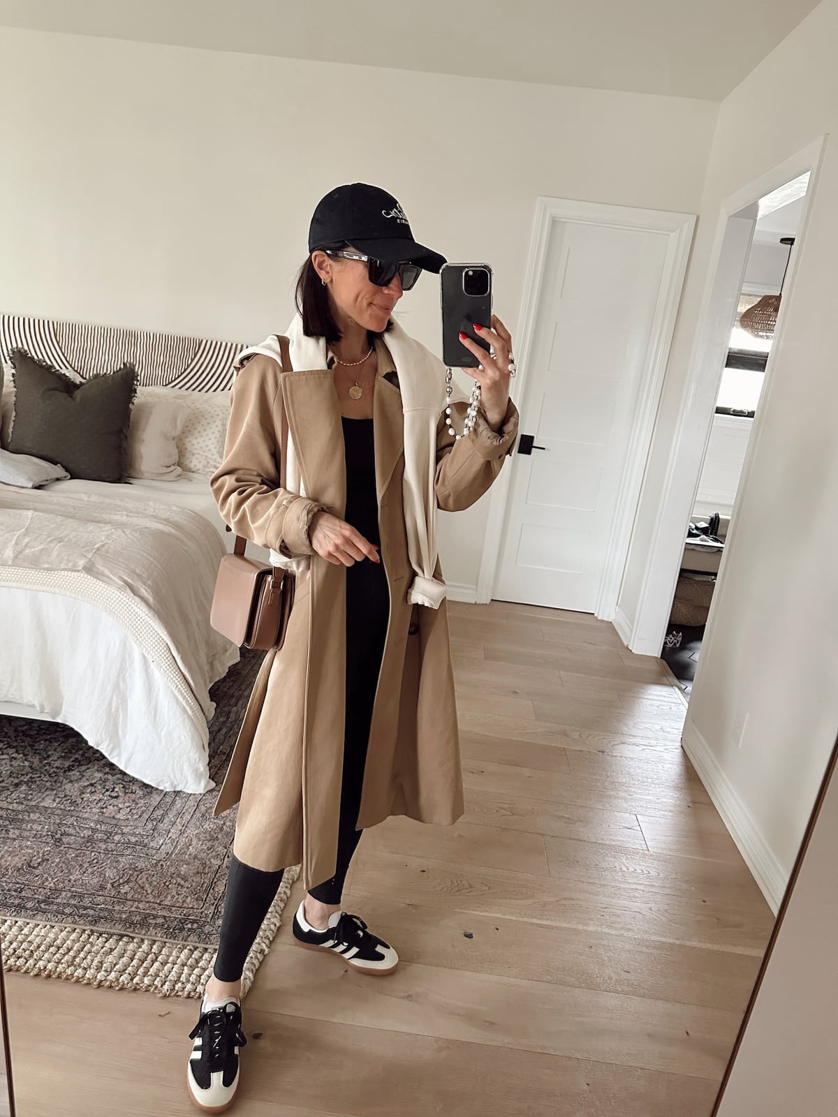 Beige Trench Coat Black Bodysuit and Black White Adidas, Close-Up Take Beige Trench Coat Black Bodysuit and Black White Adidas, Close-Up Take — Classy Adidas Samba Outfits