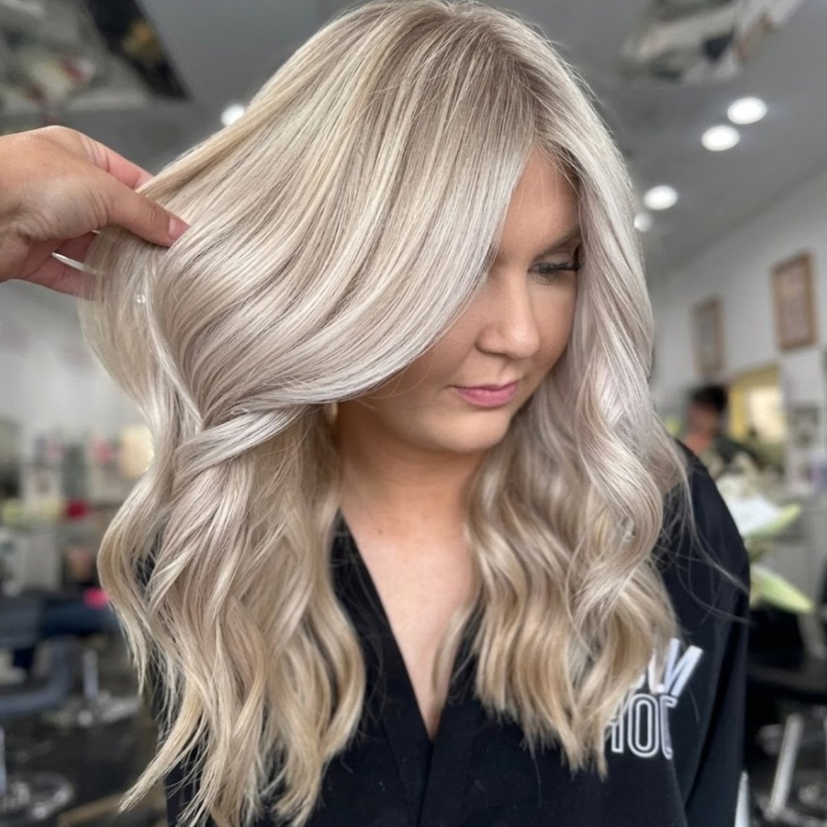 Mid-Back Ash Blonde With Platinum Highlights and Side Swept Bangs Mid-Back Ash Blonde With Platinum Highlights and Side Swept Bangs — Classy Ash Blonde
