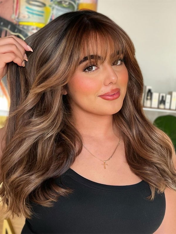 Mid-Back Layers With Full Bangs — Classy Bangs for Round Face