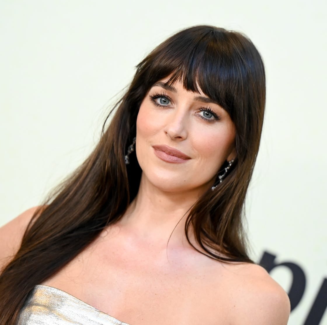Mid-Back Dark Brown With Long Curtain Bangs and A Woman With Thick — Classy Bangs for Round Face