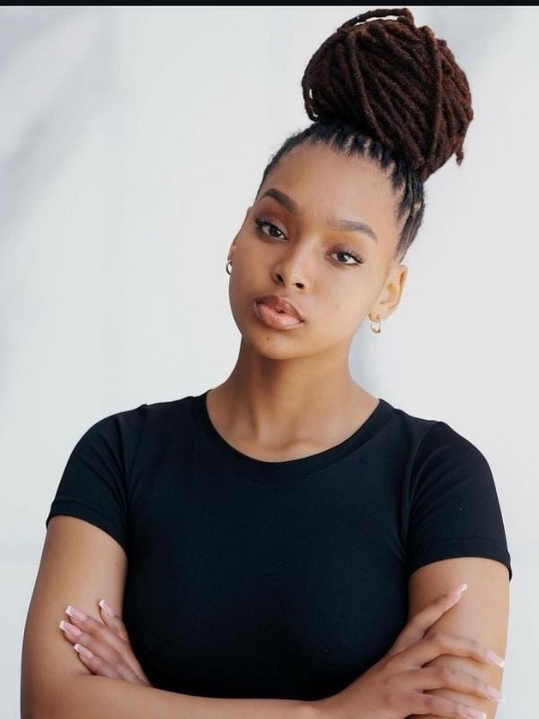 High Bun With Loose Face-Framing Tendrils — Classy Barrel Locs