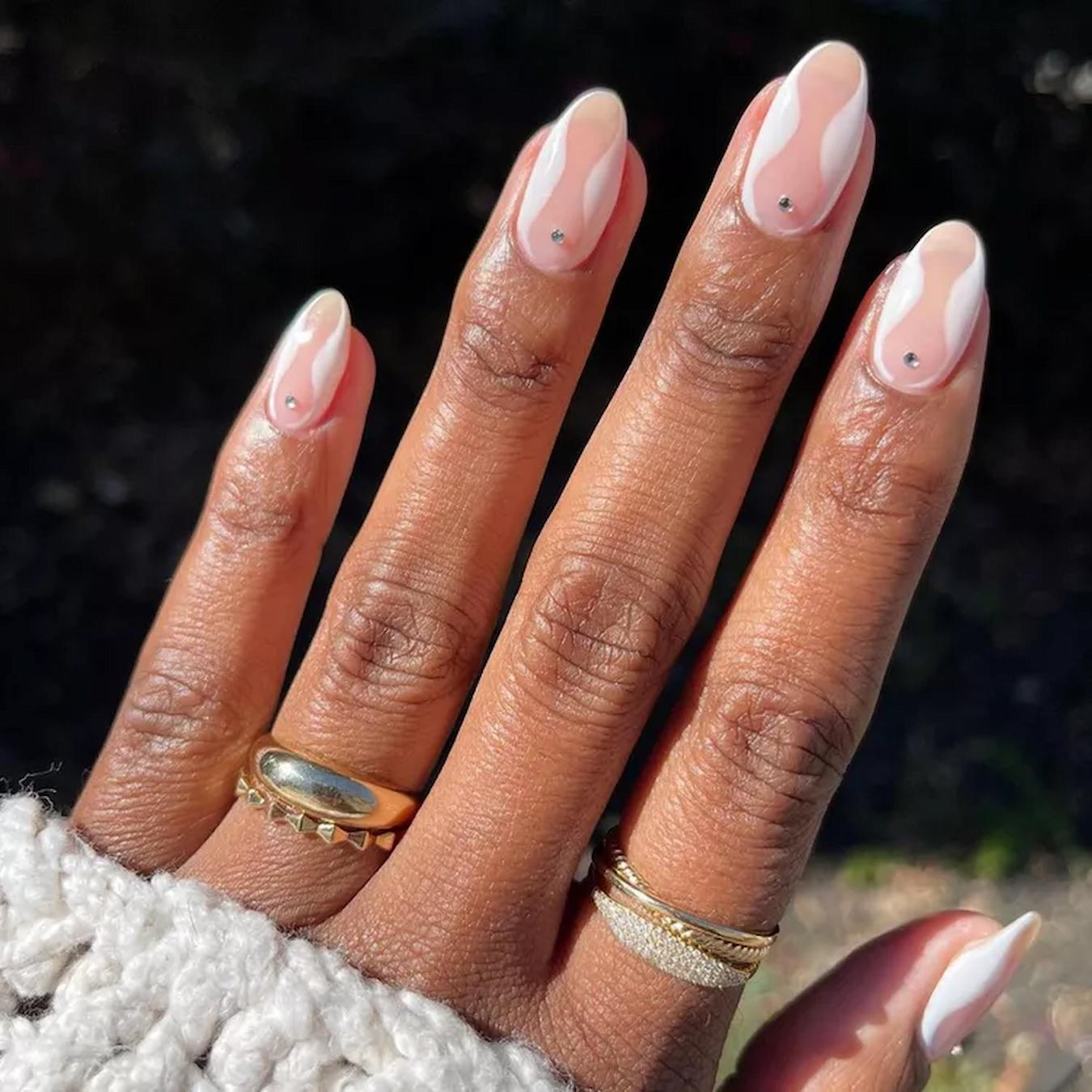 Medium Oval Nude With White Lines And Gold Studs Medium Oval Nude With White Lines And Gold Studs — Classy Basic Nails