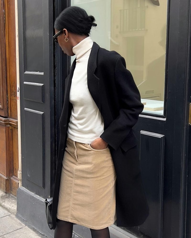 Black Wool Coat Over Cream Turtleneck and Beige Corduroy Skirt — Classy Beige Outfits