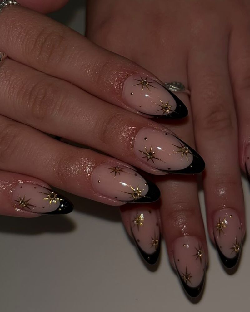 Long Pointed Almond With Gold Star Accents Long Pointed Almond With Gold Star Accents — Classy Black French Tip Nails