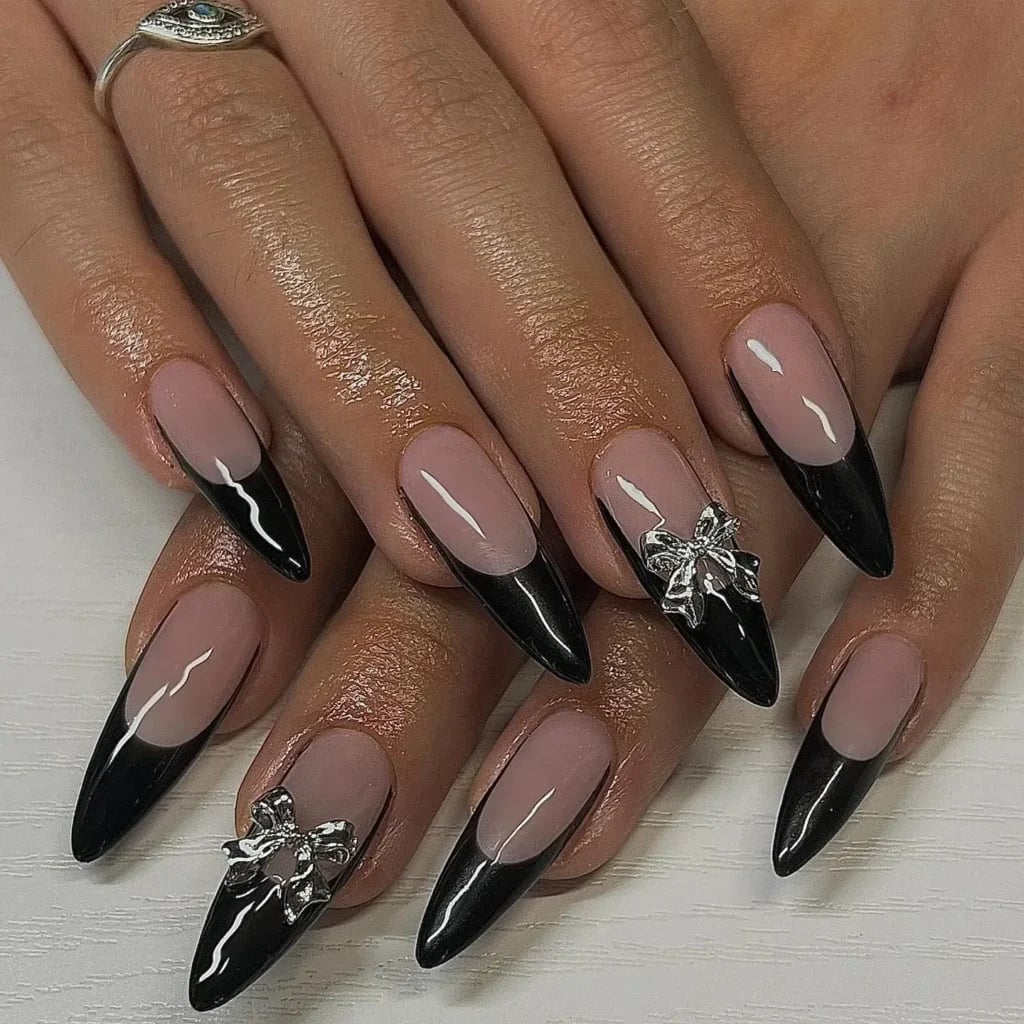 Long Stiletto With Silver Bow Charms Long Stiletto With Silver Bow Charms — Classy Black French Tip Nails