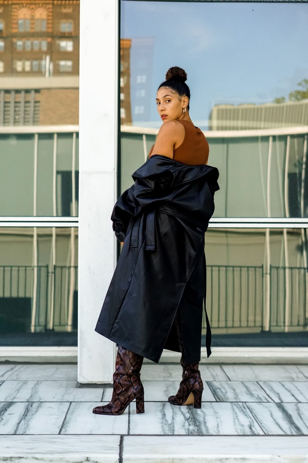 Off-Shoulder Leather Trench Coat With Patterned Trousers — Classy Black Trench Coat Outfit
