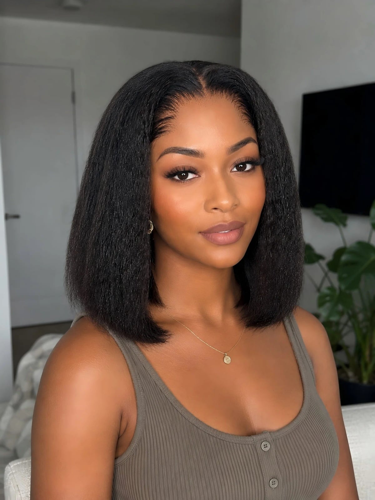Sleek Chin Length Bob With Side Bangs and A Glossy Finish — Classy Blowout Hairstyles Black Women