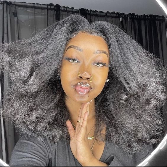 Mid-Back Black Hair Voluminous Blowout With Curtain Bangs, Wavy — Classy Blowout Hairstyles Black Women