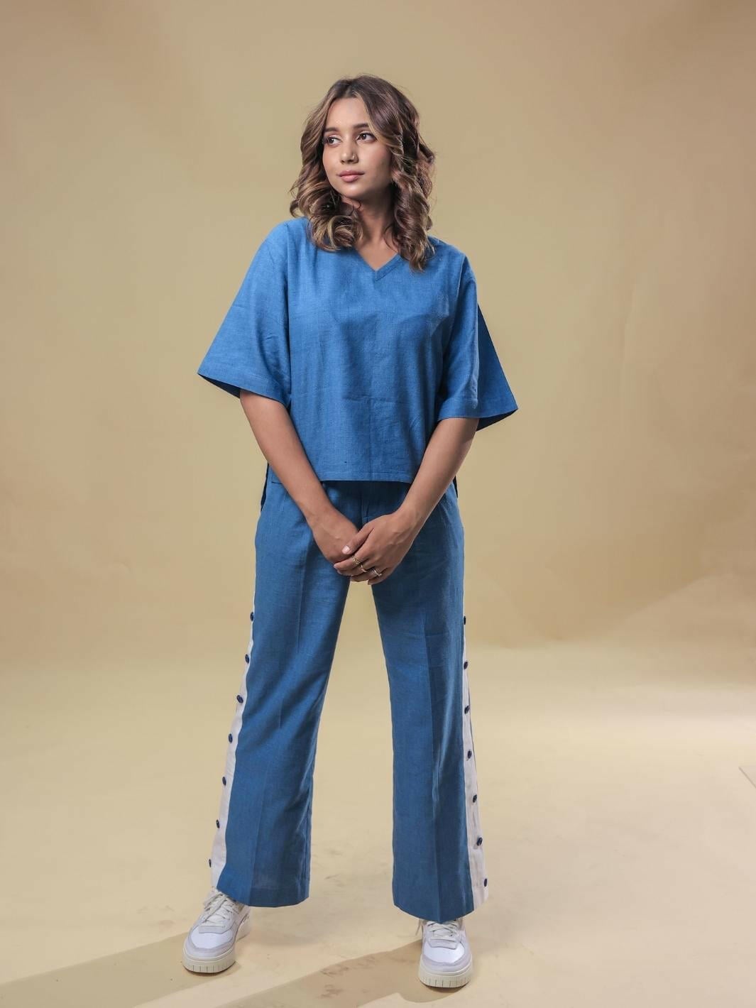 Blue V-Neck Top and Matching Wide-Leg Trousers Set, Close-Up Take Blue V-Neck Top and Matching Wide-Leg Trousers Set, Close-Up Take — Classy Blue Top Outfits