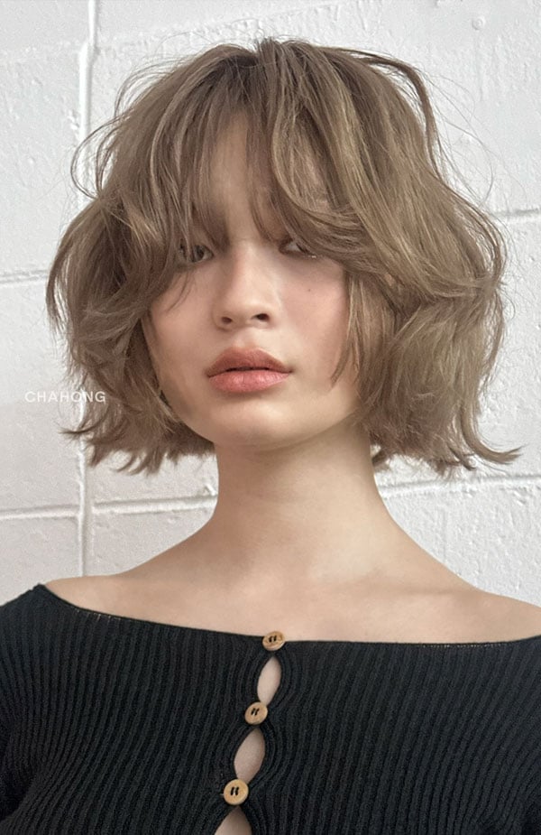 Collarbone Bob With Soft Layers And Curtain Bangs Collarbone Bob With Soft Layers And Curtain Bangs — Classy Bob for Fine Hair